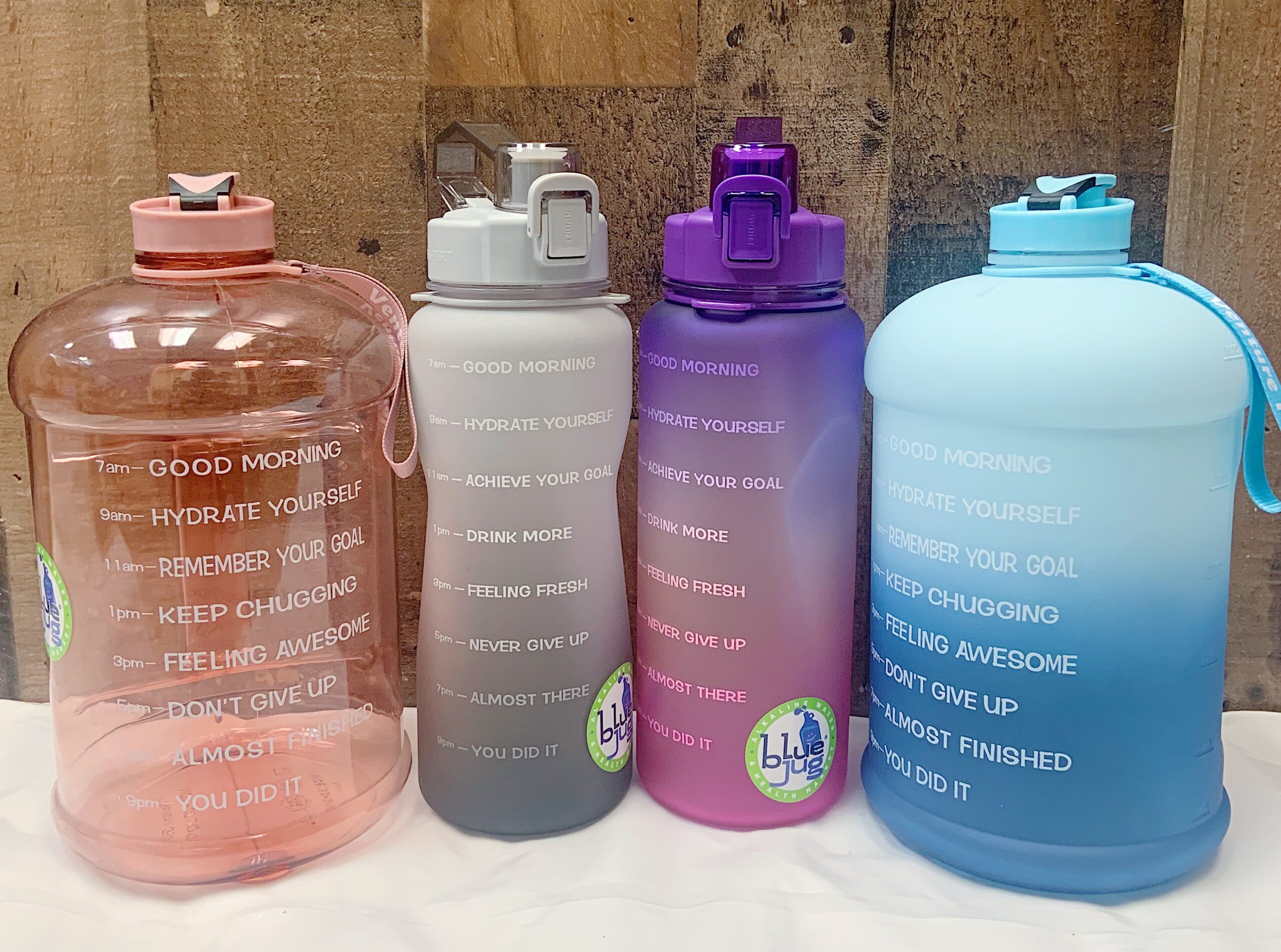 Water bottles designed for goal measurement, available in a range of colors to suit individual preferences. These bottles offer a practical and motivational way to track hydration
