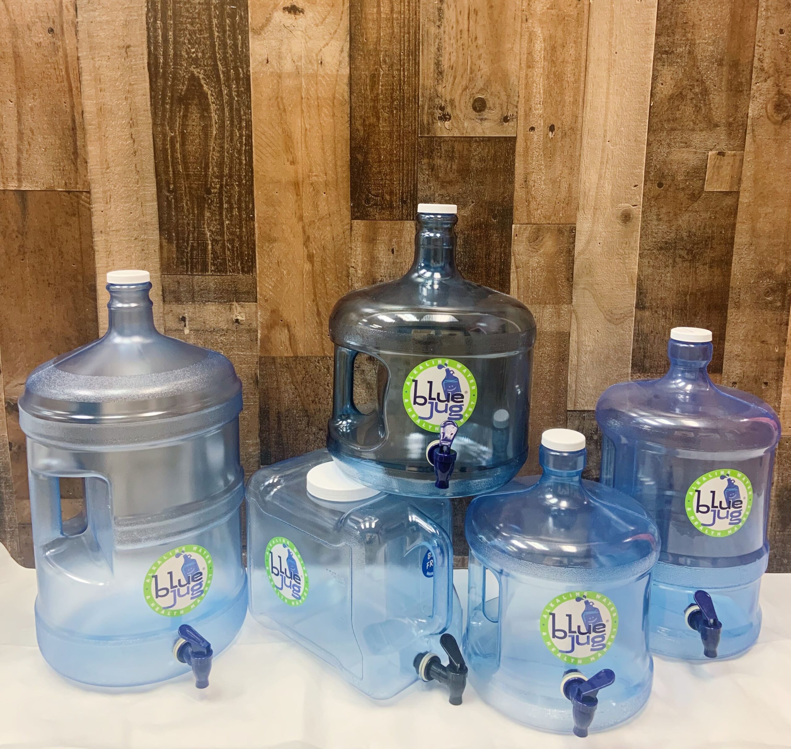 A collection of diverse drinking water filters adorned with the recognizable Blur Jug logo